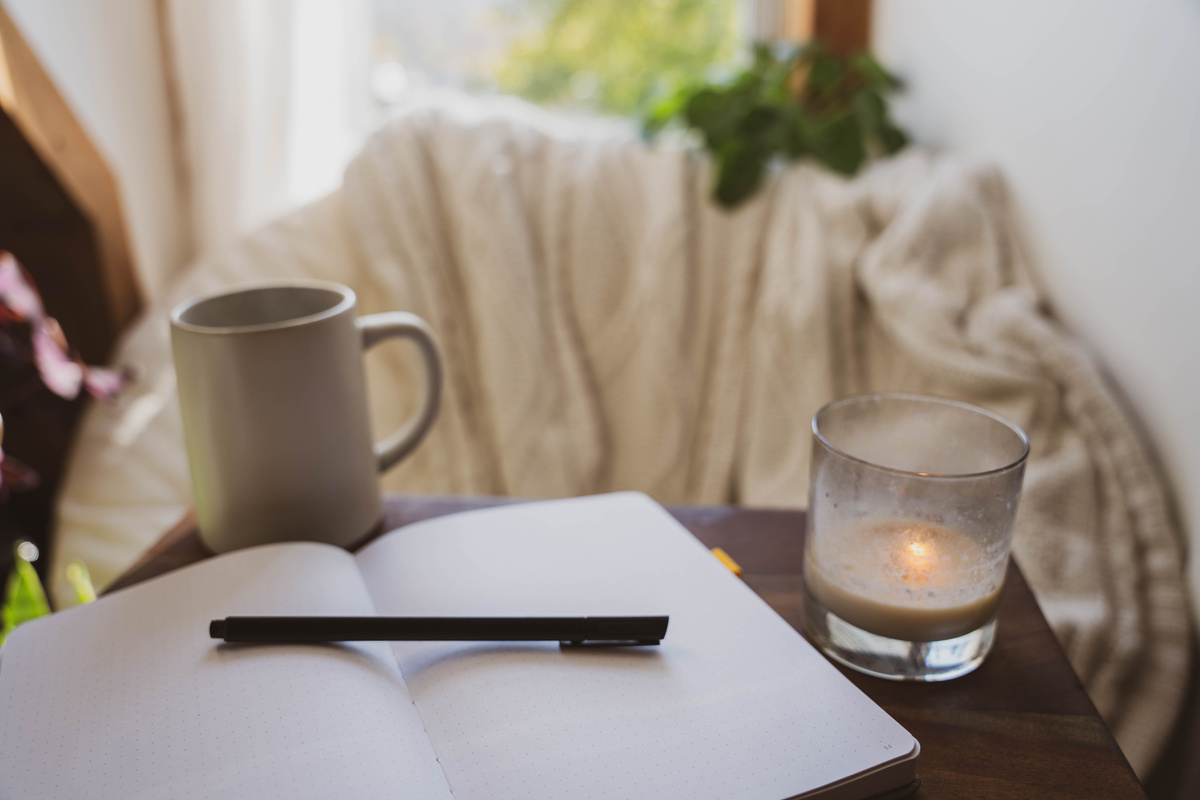 Cozy Window Nook with Open Journal And Coffee